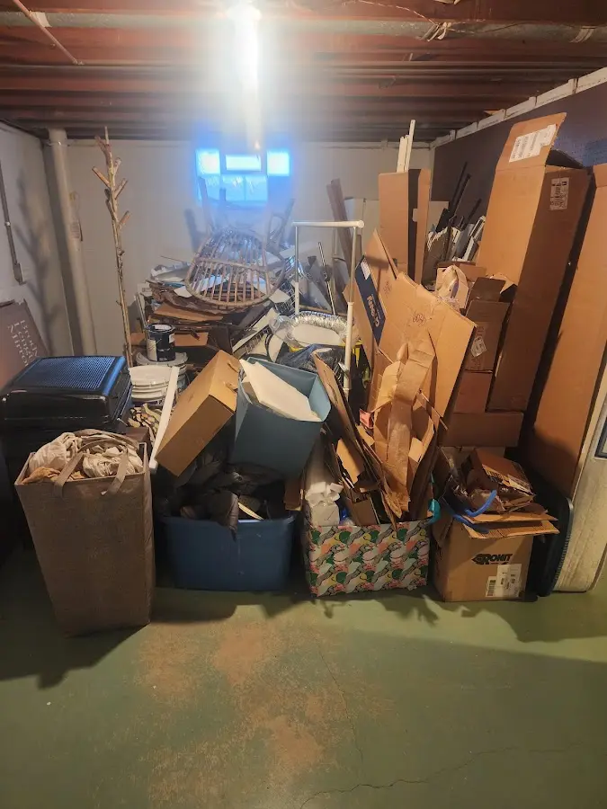 Roll-off dumpster container at job site for 6 Yard Dumpster Rental in Monticello